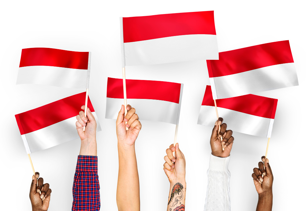 kobi education-kontribusi alumni aas indonesia-gambar berbagai tangan sedang menunjukkan bendera indonesia